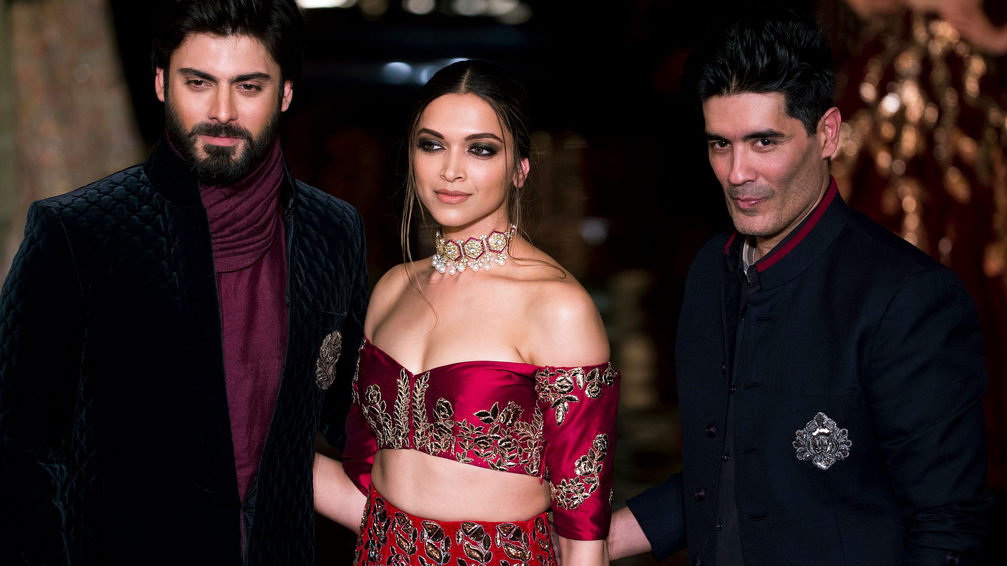 

Deepika Padukone , Fawad Khan and Manish Malhotra on the first day of the fashion week. (Photo : AP)