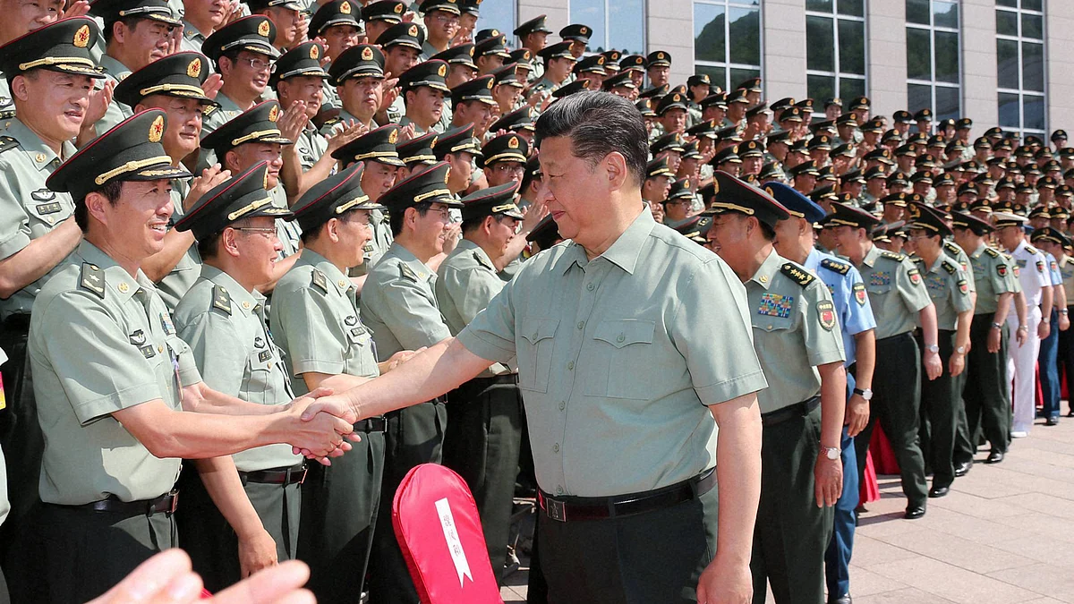 Chinese President Xi Jinping shaking hands with the military.