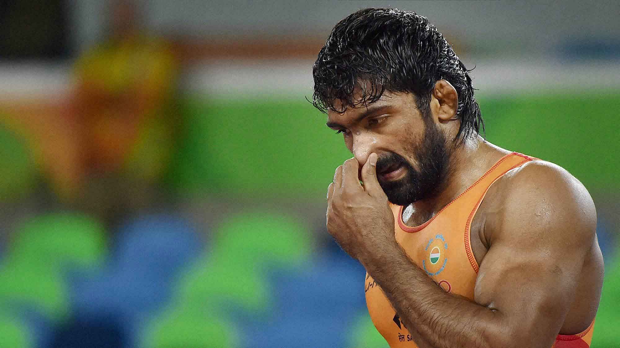 Yogeshwar Dutt in action in the first round bout at the Rio Olympics. (Photo: Reuters)