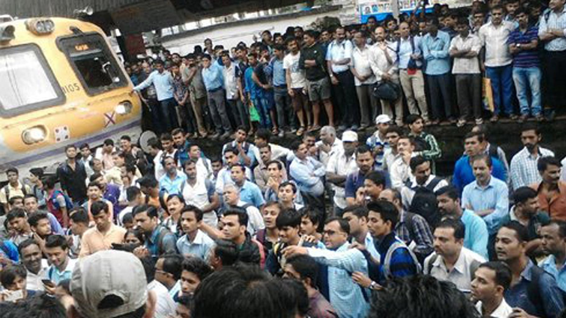 Commuters protest against the everyday delay of local trains. (Photo: Ashish Dikshit)