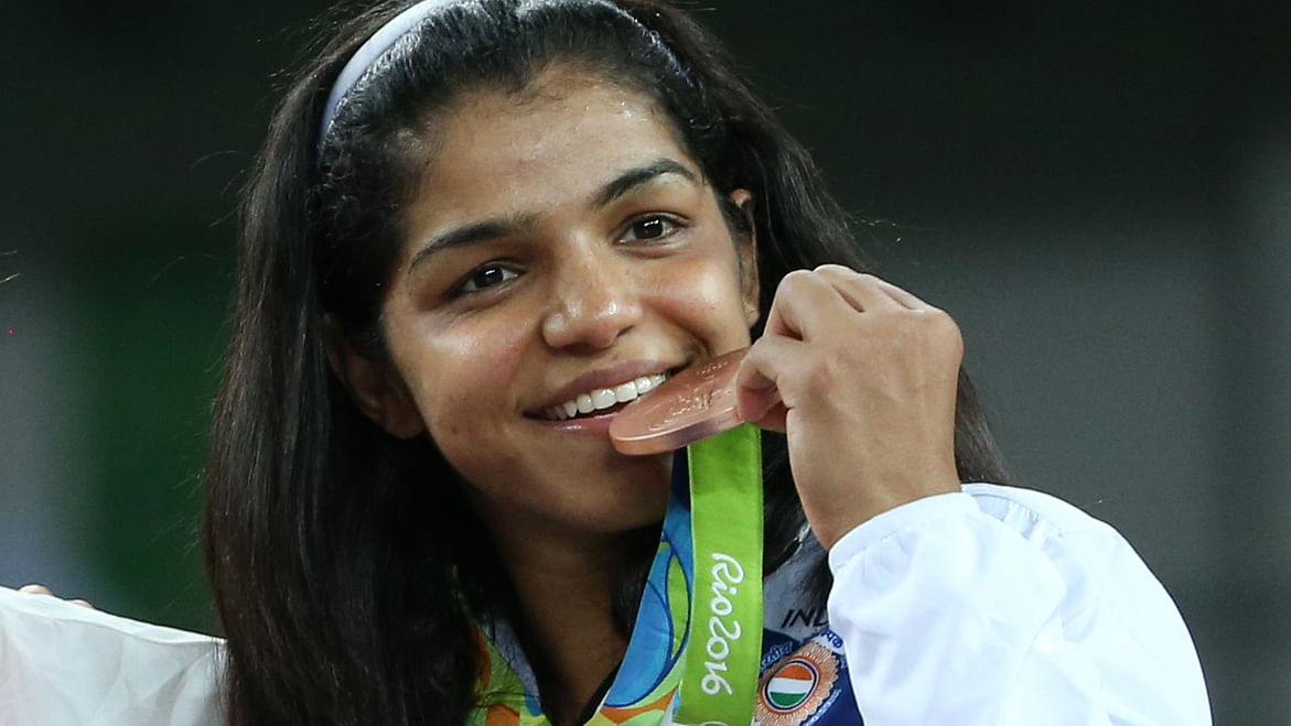 Sakshi Malik with the 58kg freestyle wrestling bronze medal. (Photo: Reuters)