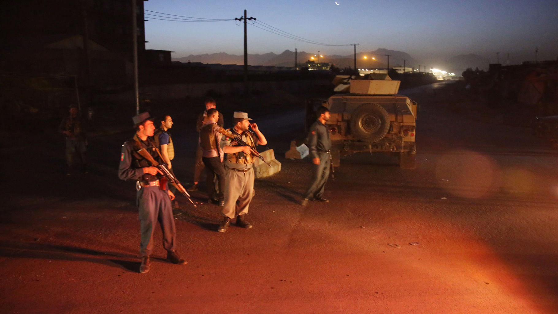 

Afghan police block a road leading to the site of an explosion in Kabul on Monday. (Photo: AP)