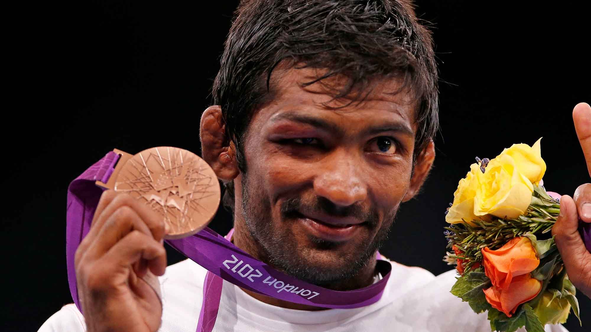 Yogeshwar Dutt with the bronze medal he won at the London Olympics. (Photo: Reuters)