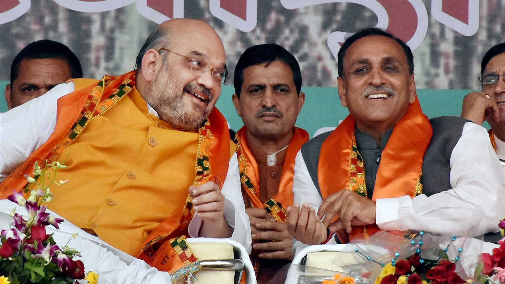 File photo of Vijay Rupani with BJP President Amit Shah in Surat. Rupani was on Friday chosen by the Gujarat BJP as the State’s next Chief Minister. (Photo: PTI)