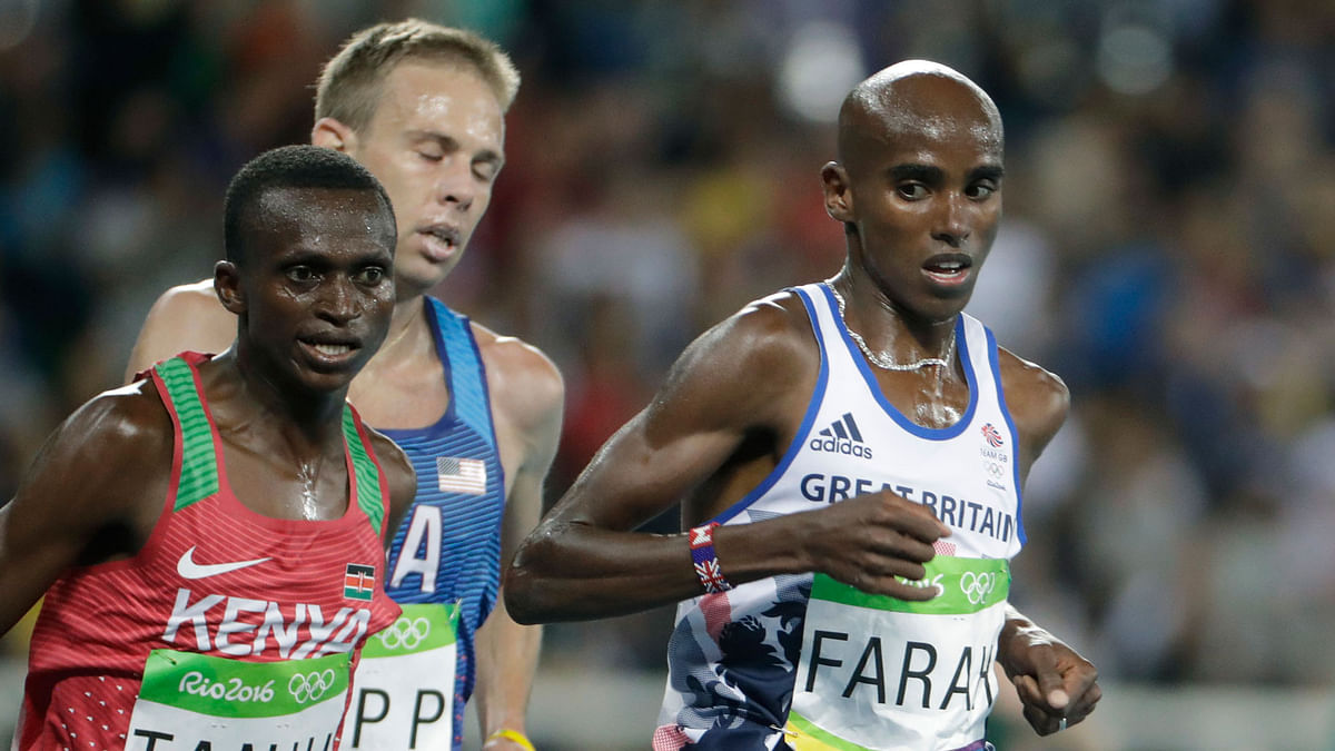 Britain’s Mo Farah defends his Olympic title in 10,000m finals at Rio as he clocked 27 min & 5 secs to win  gold.  