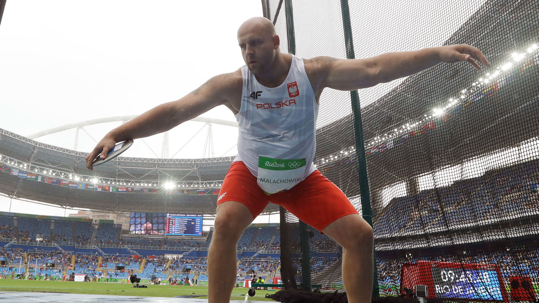  Poland’s Piotr Malachowski competes in a qualifying round of the men’s discus throw during the athletics competitions of the 2016 Rio Olympics. (Photo: AP)
