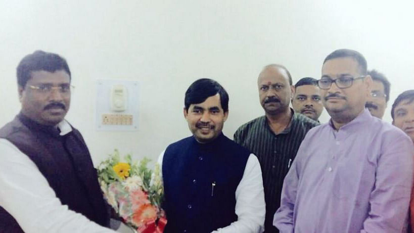 Tala Marandi with BJP spokesperson Shahnawaz Hussain. (Photo: Twitter/<a href="https://twitter.com/ShahnawazBJP">@ShahnawazBJP</a>)