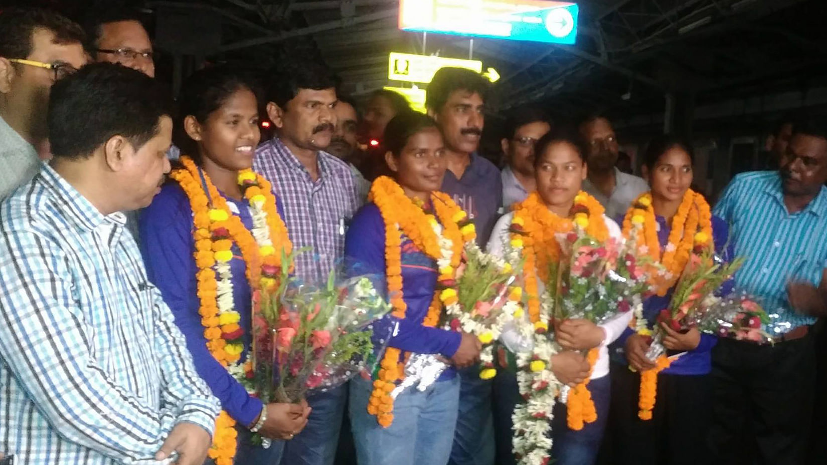 Deep Grace Ekka, Namita Toppo, Lilima Minz and Sunita Lakra greeted by local authorities at the railway station.&nbsp;