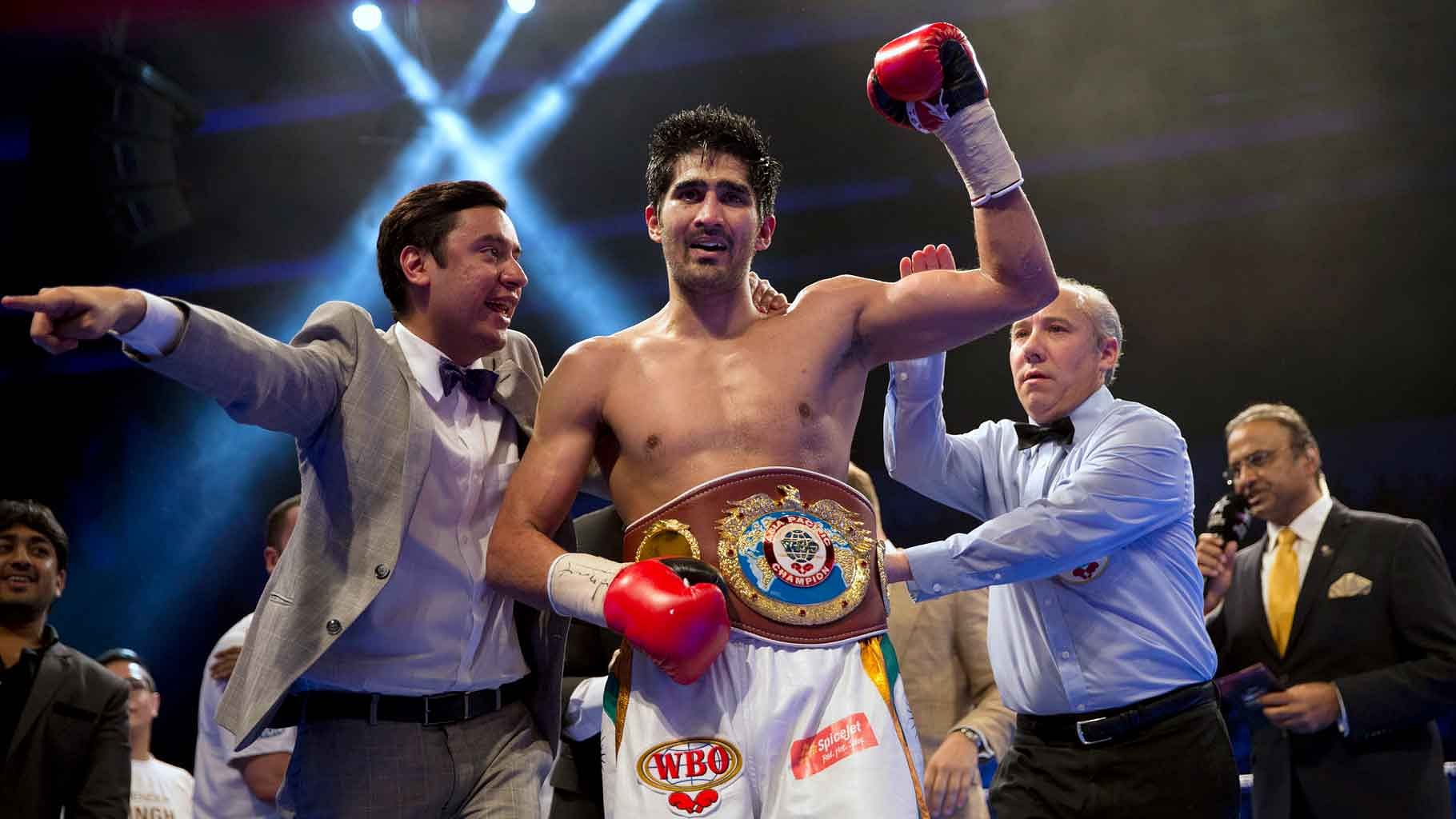India’s Vijender Singh celebrates after winning Asia Pacific Super Middleweight Championship. (Photo: AP)