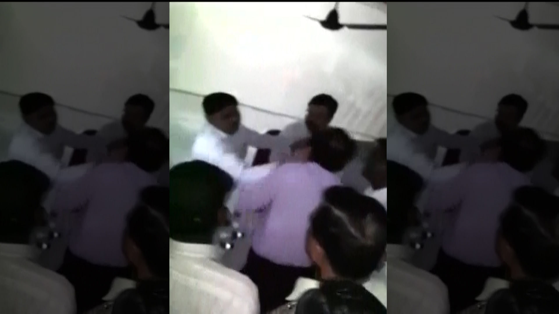 NCP MLA Suresh Lad assaults a deputy collecter Abhay Kalgudkar (Photo: ANI Screengrab)