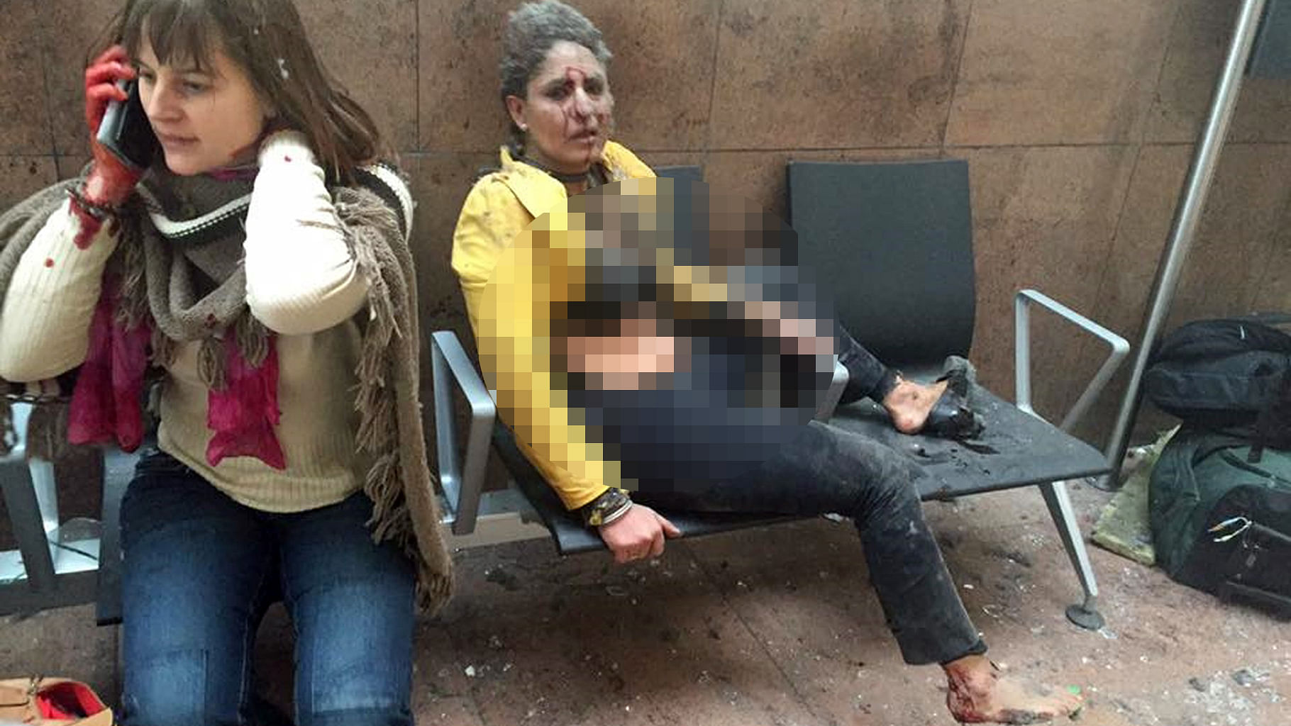 Nidhi Chaphekar, a 40-year-old Jet Airways flight attendant from Mumbai, right, and another unidentified woman after being wounded in Brussels Airport in Brussels, Belgium, after explosions were heard Tuesday, 22 March 2016.(Photo:AP)