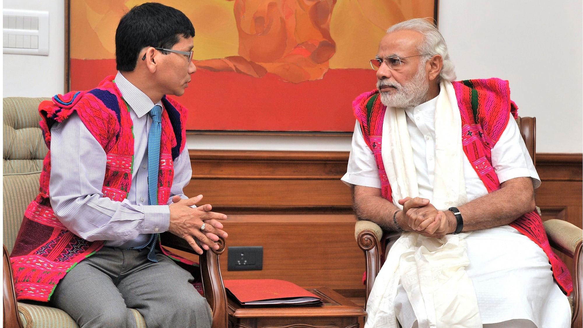 <div class="paragraphs"><p>Kalikho Pul with the Prime Minister Narendra Modi. </p></div>