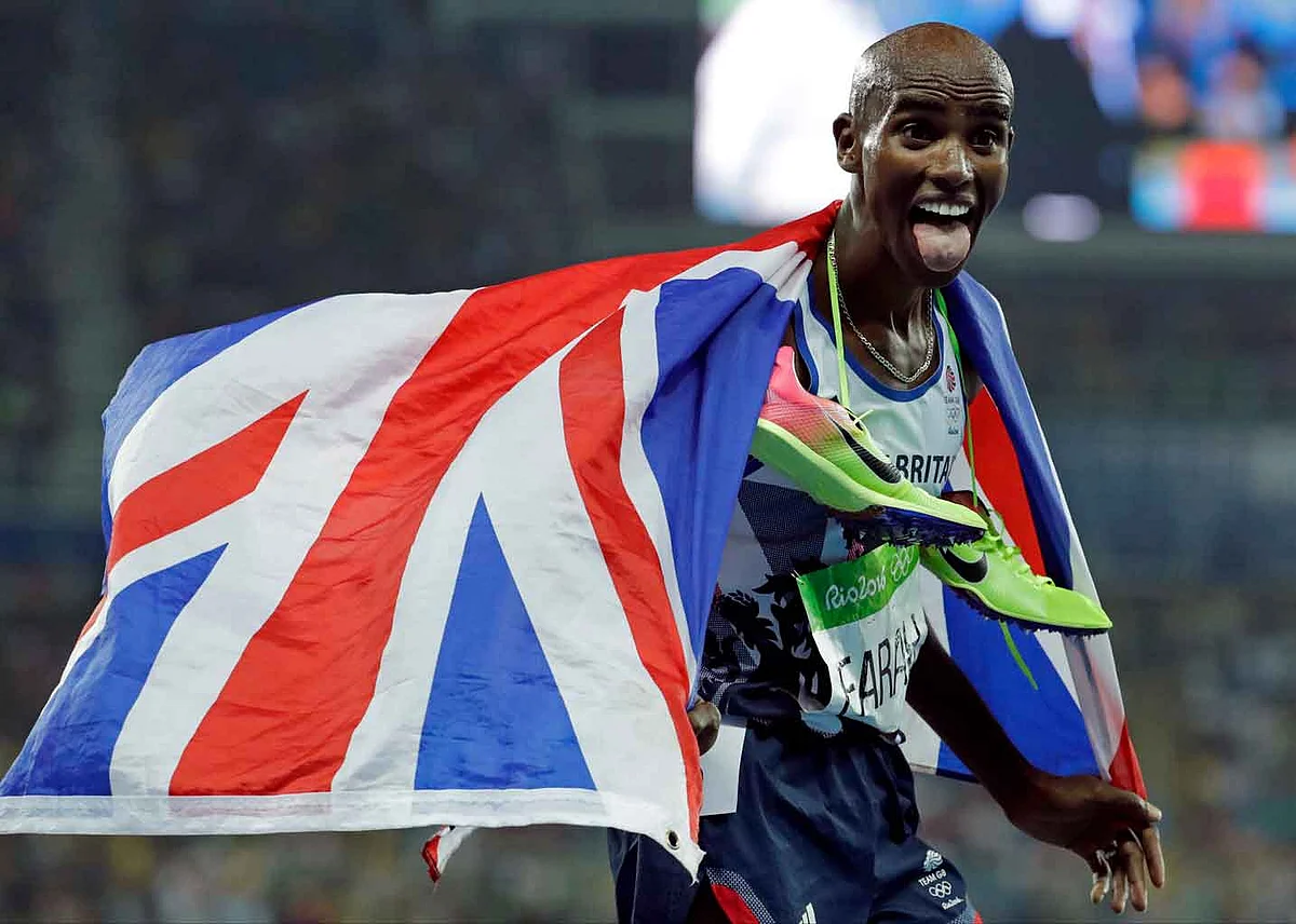 Britain’s Mo Farah celebrates winning the men’s 5000-meter race during athletics competitions at the Summer Olympics inside Olympic stadium in Rio de Janeiro, Brazil. (Photo: AP)