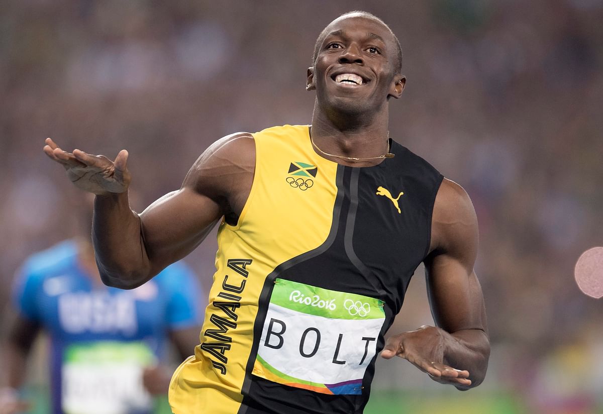 Usain Bolt became the first person to win three consecutive Olympic 100m gold medals on Sunday.