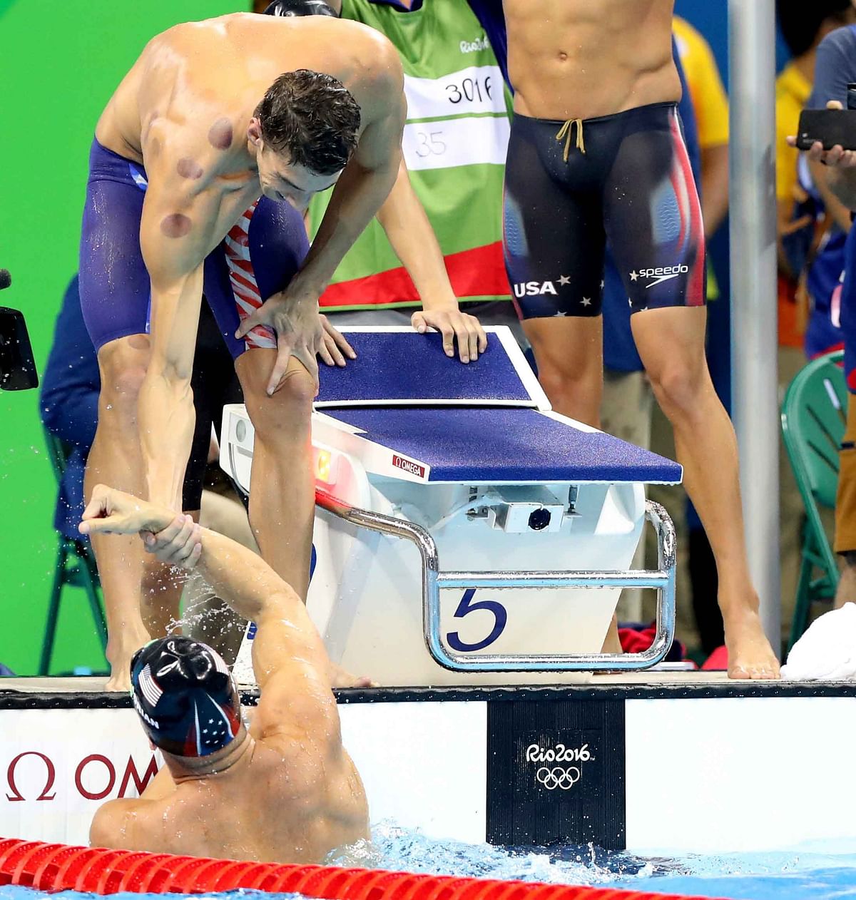

Phelps’ first competitive appearance in the pool at his fifth Games saw tears, smiles, nerves and cheers!