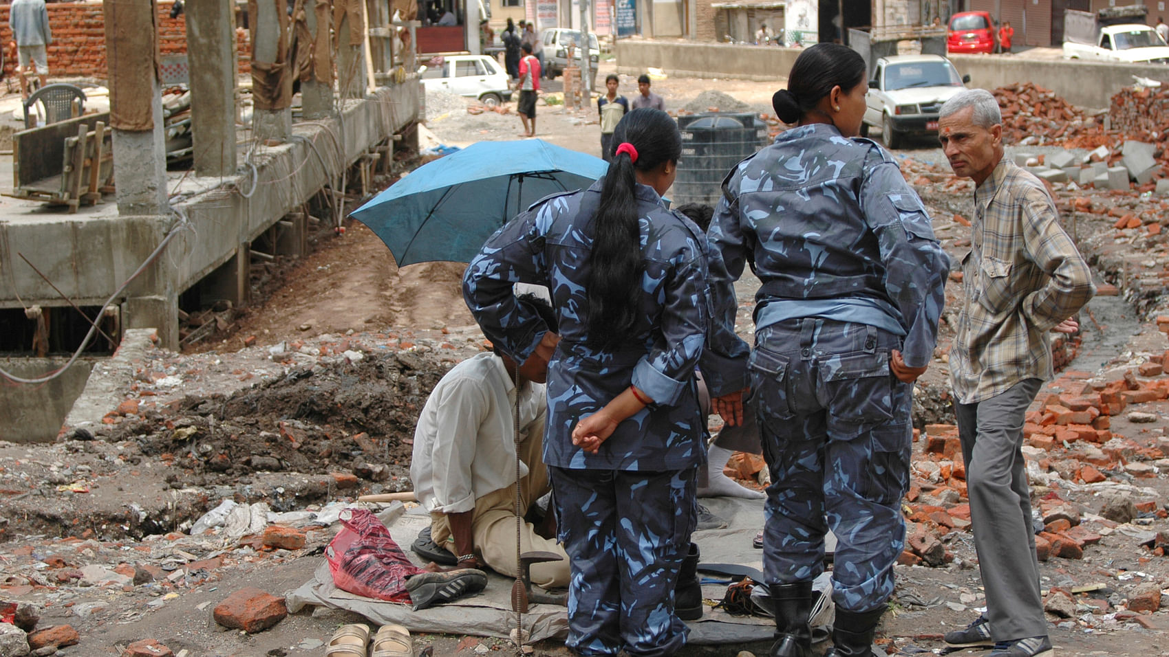 Police officers on duty at the site of a destroyed house in Nepal. (Photo: <i>iStock</i>)