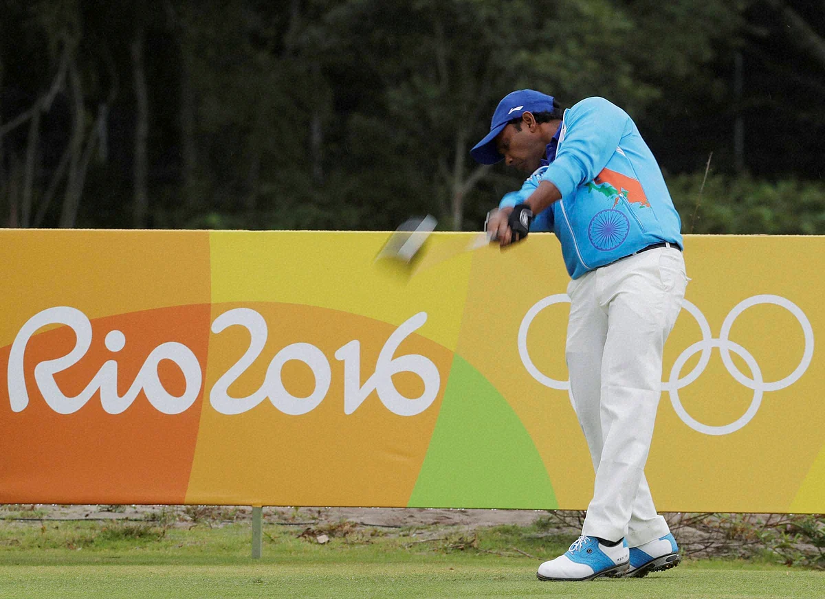 Shiv Chawrasia of India drives on the third tee during the second round of the men’s golf event. (Photo: AP)