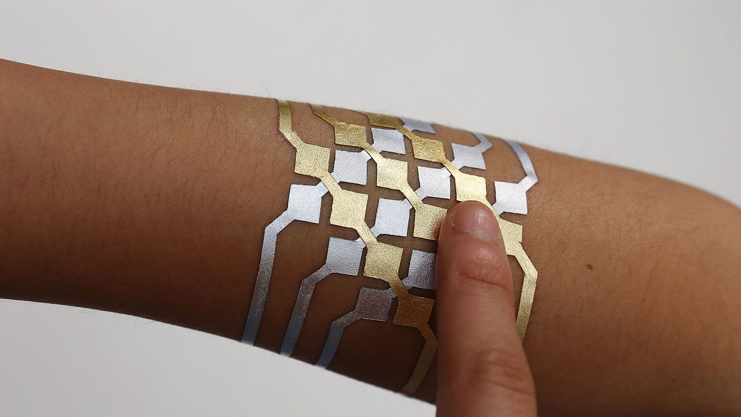 The tattoos can be used to store data and send instructions to other devices. (Photo Courtesy: <a href="http://duoskin.media.mit.edu/">DuoSkin</a>)