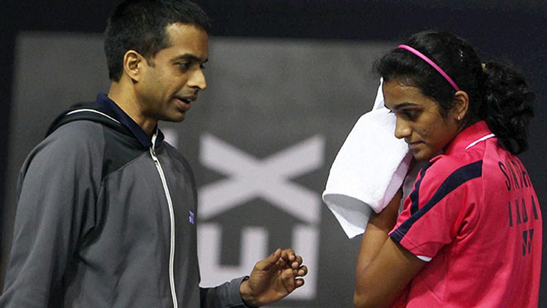 File photo of Pullela Gopichand (L) and PV Sindhu (R).
