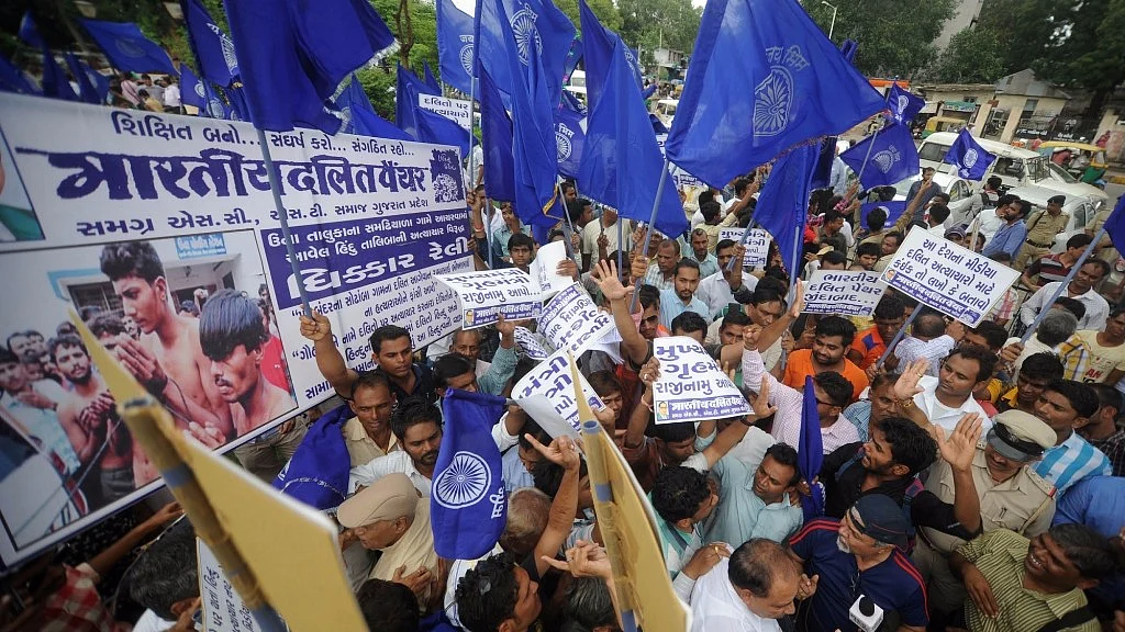 Bhartiya Dalit Panther (BDP) members stage a demonstration against Dalit Assault Case at Una, in Ahmedabad on 19 July, 2016. (Photo: IANS)