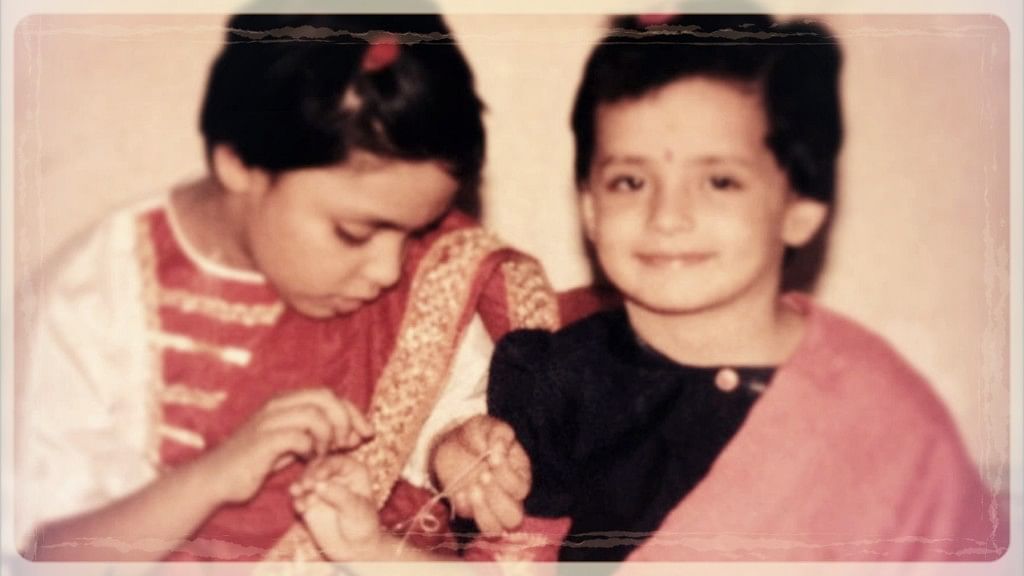 A smug younger me vowing to protect my elder sister, as we revel in our rebellious appropriation of <i>Raksha Bandhan</i>. Who needs a brother when you’ve got a sister who believes she can stop global warming single-handedly? (Photo: Pallavi Prasad) 