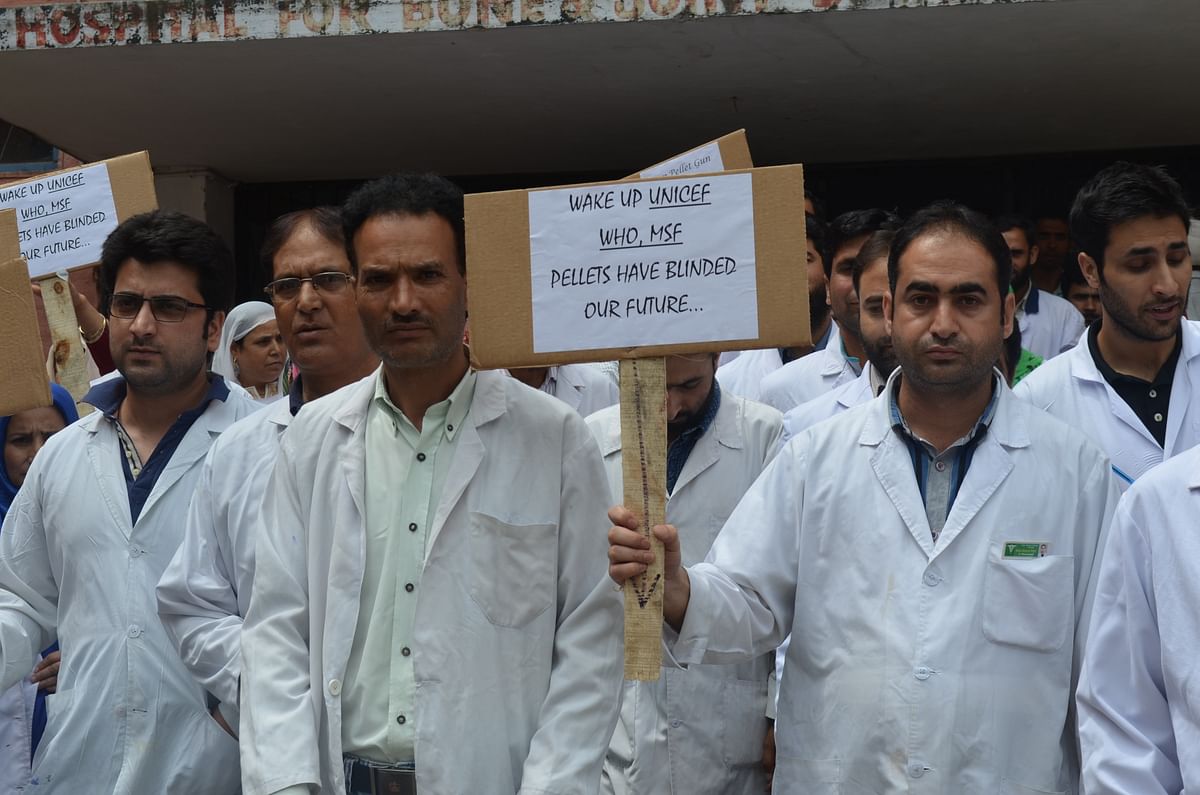 The protesters  ask WHO, UNICEF and MSF to sit up and pay attention to the brutal use of pellets in Kashmir.