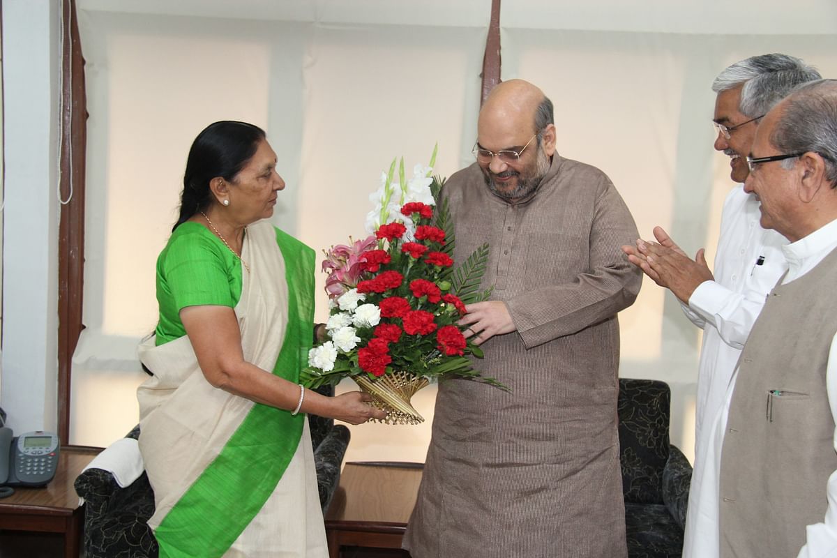 Gujarat has got a new CM, but not without an ugly confrontation between top BJP leaders.