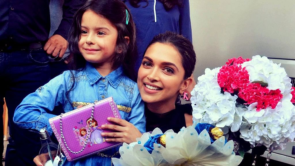 Deepika Padukone poses with her young co-star. (Photo: Yogen Shah)