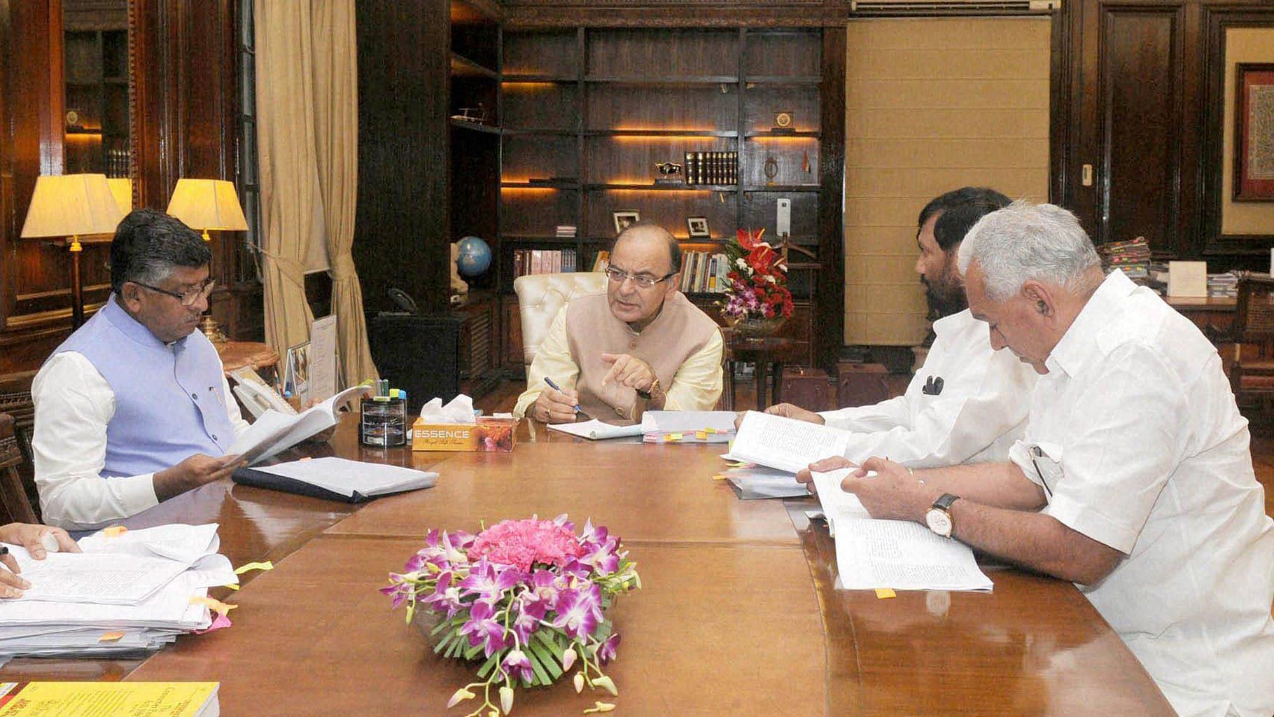  Union Minister for Finance and Corporate Affairs, Arun Jaitley chairing a meeting of the Group of Ministers (GoM) on issues relating to Amendments to Consumer Protection Bill 2015. (Photo: PTI)