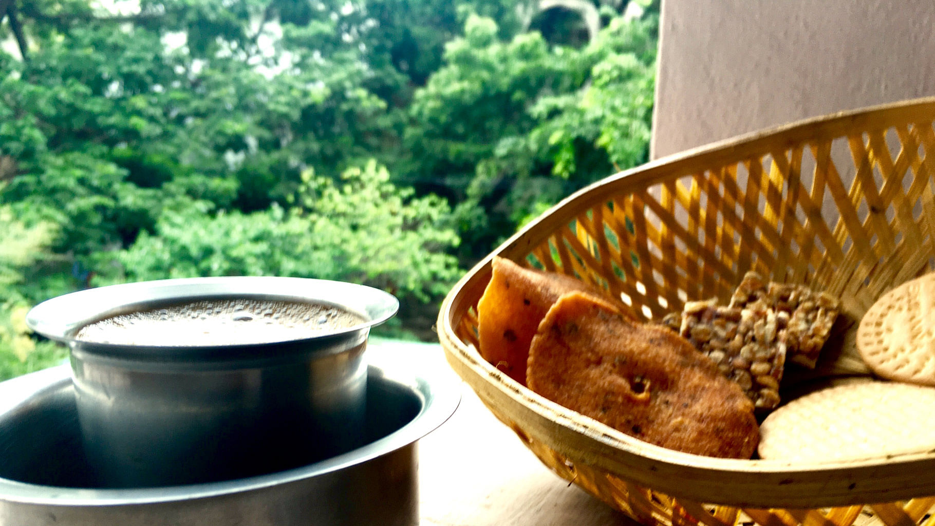 Filter Coffee, <i>Thattai, </i>groundnut burfi and biscuits. On the balcony. Sigh. (Photo: Vikram Venkateswaran, who has emptied the contents of the photo)