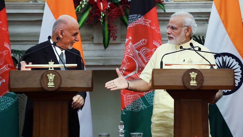 Afghan President Ashraf Ghani and PM Narendra Modi after signing bilateral agreements in New Delhi on Wednesday. (Photo: AP)