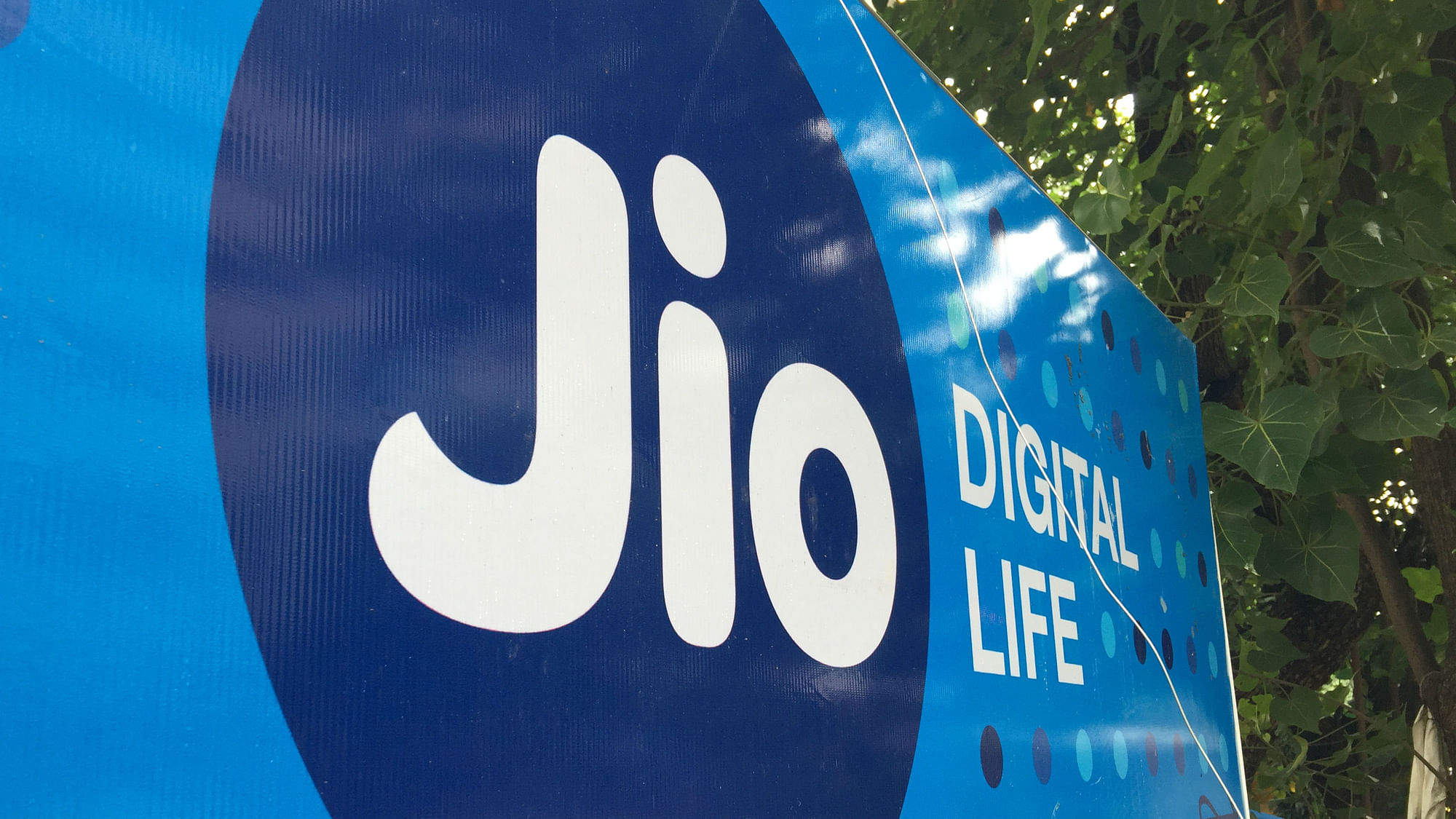 Reliance Jio board outside a mobile store. (Photo Courtesy: BloombergQuint)