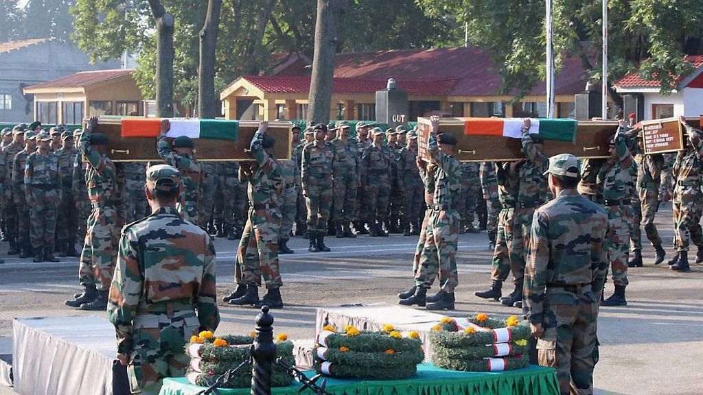 

Wreath laying ceremony of 17 soldiers who died in Uri terror attack in Srinagar. (Photo: PTI)