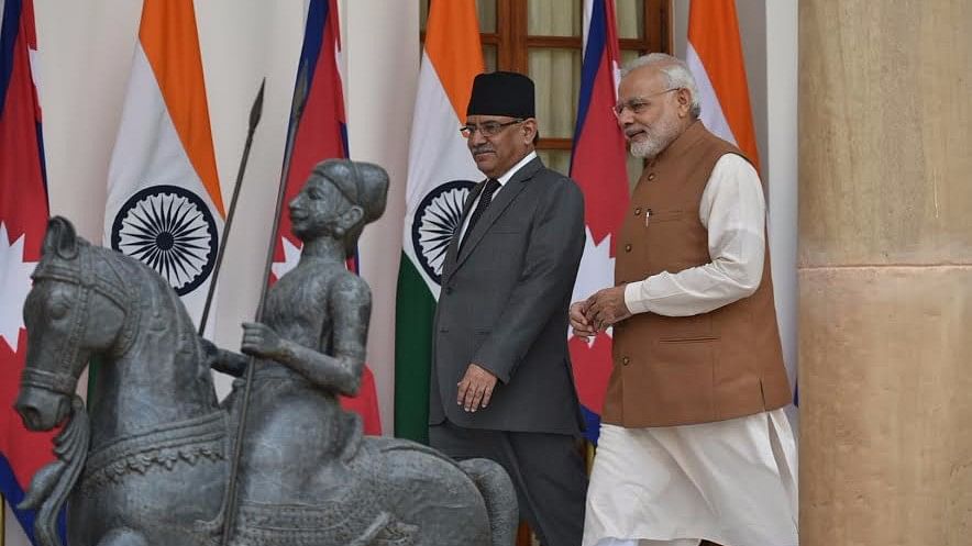 Nepal’s Prime Minister Pushpa Kamal Dahal and Prime Minister Narendra Modi. (Photo Courtesy: Twitter/<a href="https://twitter.com/PIB_India/status/776670962590765060">@PIB_India</a>)