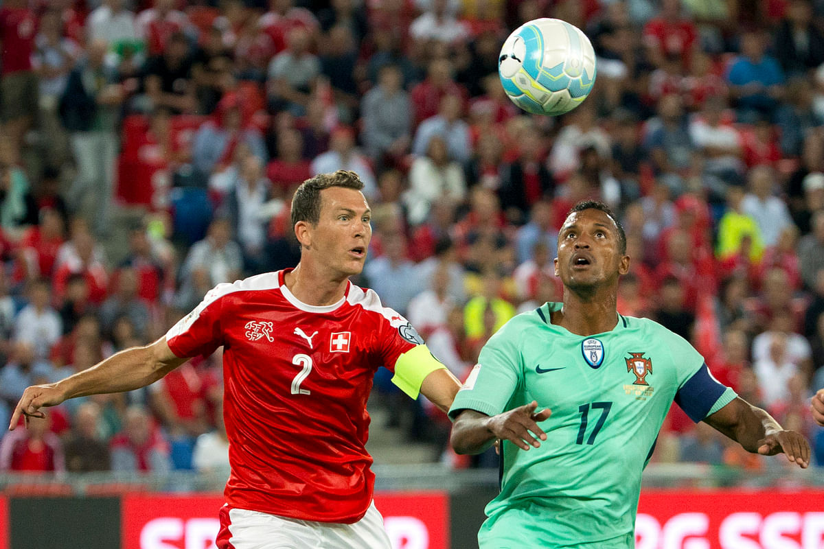 Switzerland struck twice in quick succession to stun Euro 2016 champions Portugal 2-0 in a World Cup qualifier.
