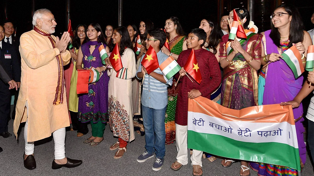 Over a hundred expatriate Indians gathered at a hotel in Hanoi to get a glimpse of PM Narendra Modi. (Photo: PTI)