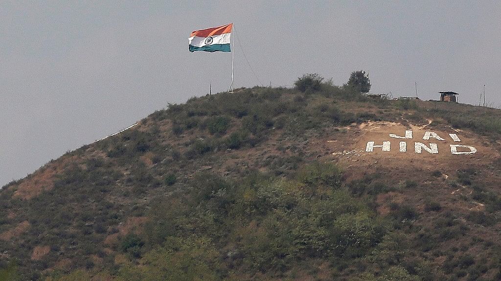 An Indian flag flies on a hill in Uri sector, near the de-facto border dividing Kashmir between India and Pakistan, in Indian controlled Kashmir.&nbsp;