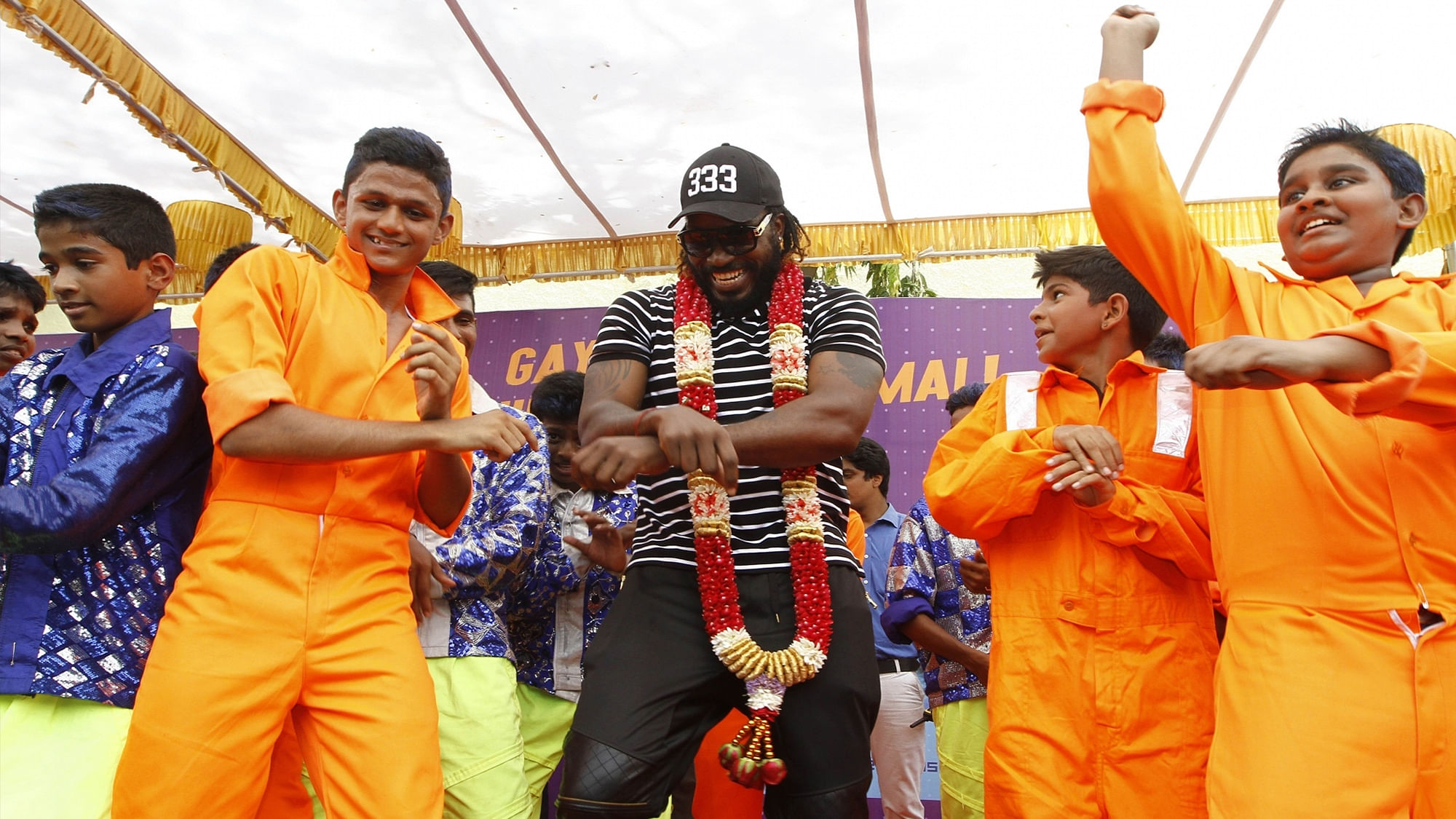 West Indies cricketer Chris Gayle during his visit to Vellammal school in Chennai on Tuesday. (Photo: IANS)