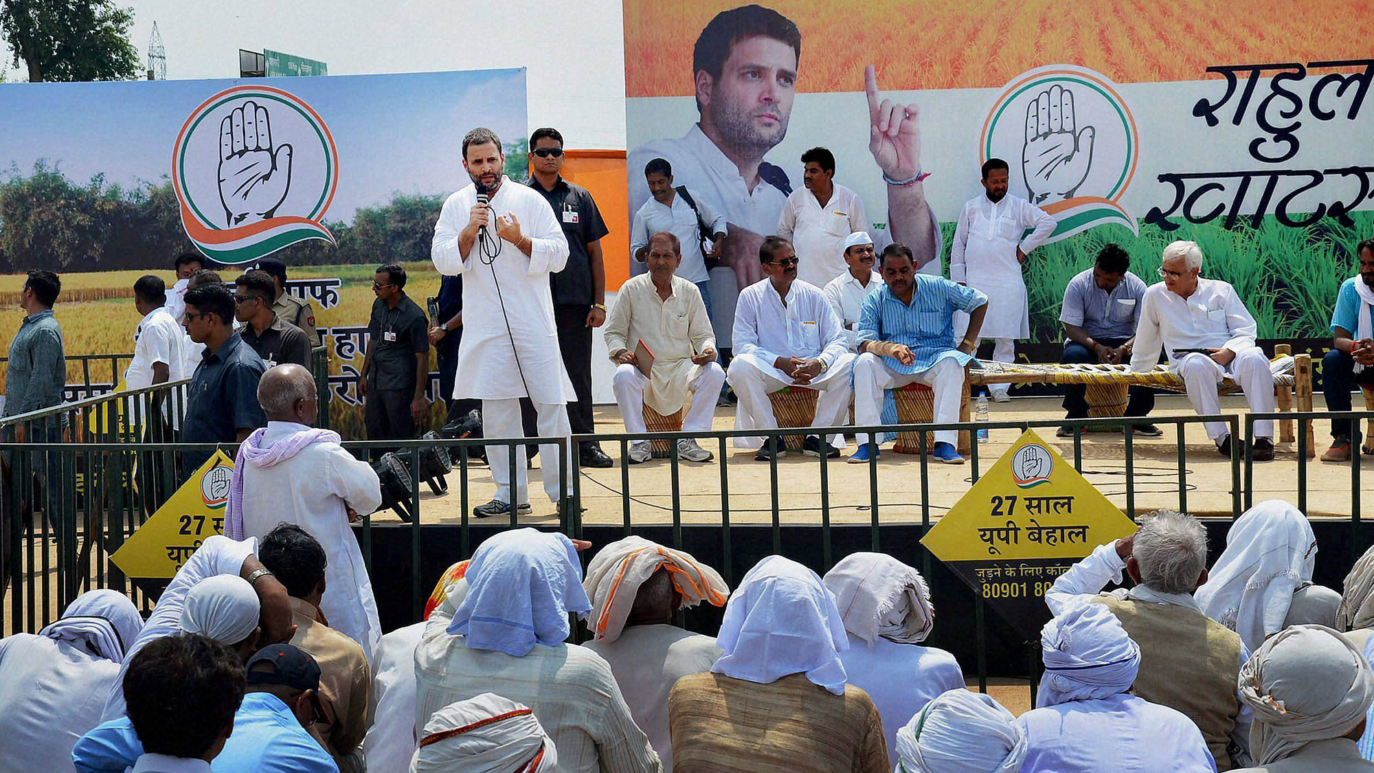 Congress Vice President Rahul Gandhi interacts with farmers at ‘Khat Pe Charcha’ programme during his Kisan Yatra in Mirzapur on Wednesday. (Photo: PTI)