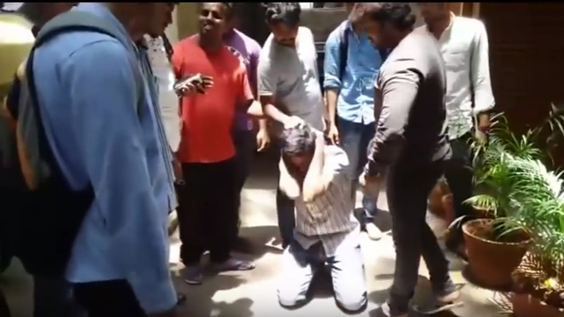 22-year-old student filmed being thrashed by a group of locals in Bengaluru over Cauvery dispute comments. (Photo Courtesy: Screengrab of <a href="https://www.youtube.com/watch?v=Tuj2rVwfmI4">Youtube video</a>)
