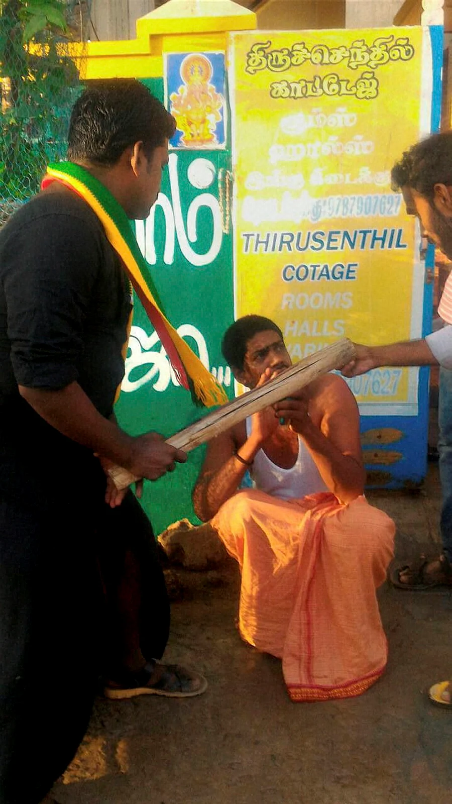 Goons of a Tamil organisation thrash the driver of a bus from Karnataka during a protest over Cauvery water row, in Rameshwaram on Monday. (Photo: PTI)