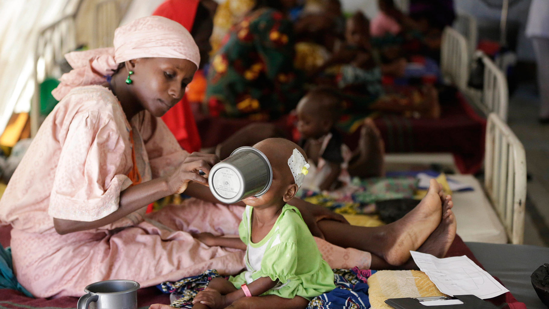 A mother feeds her malnourished child at a feeding centre run by Doctors Without Borders in Maiduguri Nigeria, Monday 29 August, 2016. (Photo: AP)