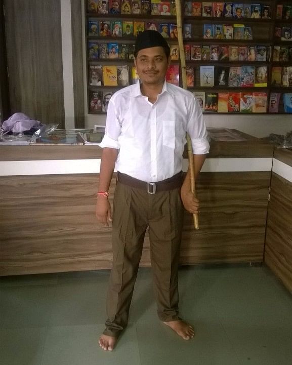 

A Rashtriya Swayamsevak Sangh (RSS) volunteer shows his new uniform at RSS headquarters in Nagpur on 31 August, 2016. (Photo: IANS)