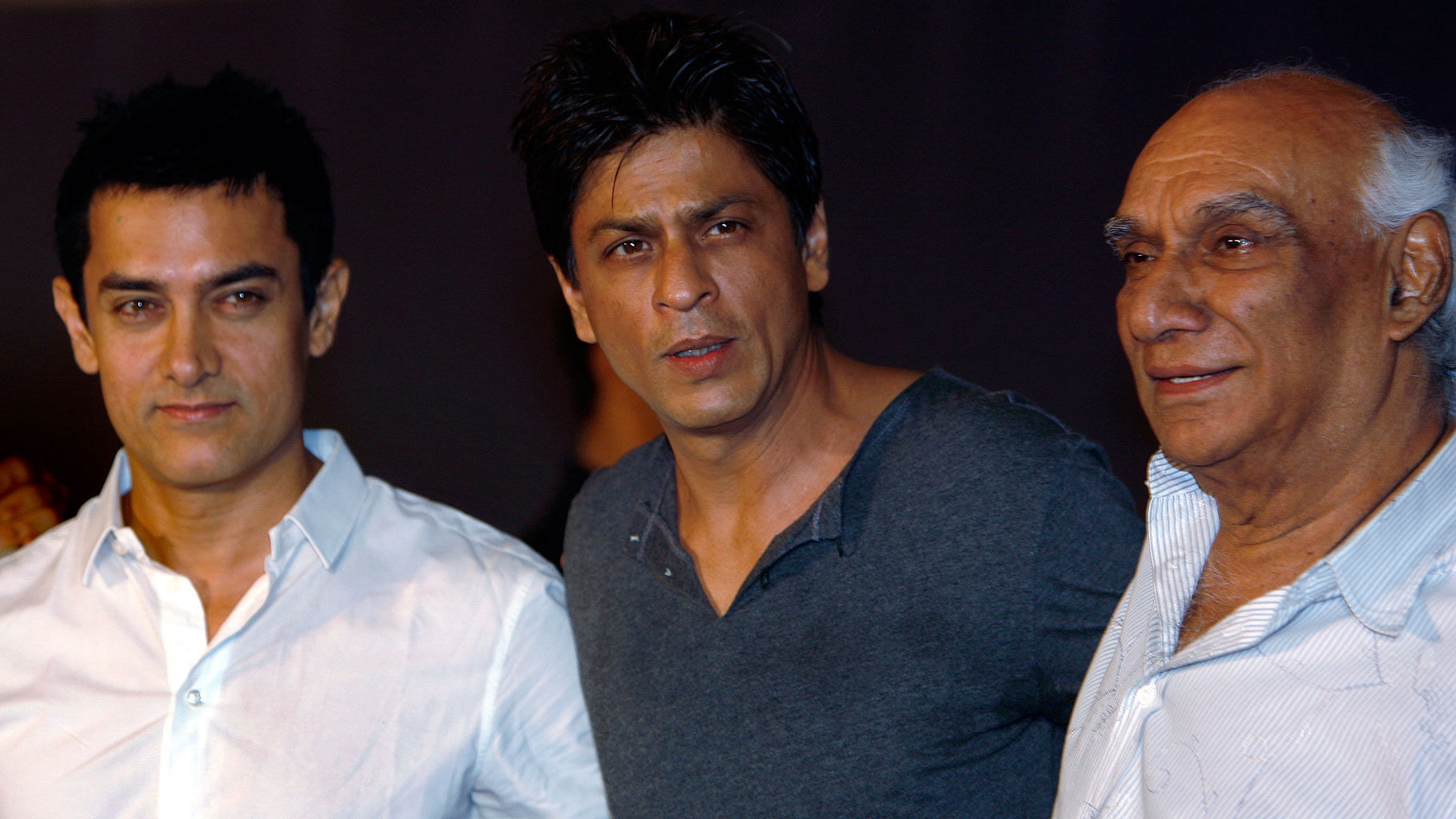 Aamir Khan, Shah Rukh Khan and filmmaker Yash Chopra during a news conference in Mumbai April 7, 2009. (Photo: Reuters)
