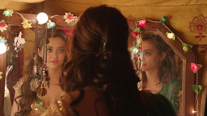 Surveen Chawla in a scene from Leena Yadav’s <i>Parched. </i>(Photo courtesy: YouTube/<a href="https://www.youtube.com/channel/UChkXkESv2ViSatGUdIN9gBw">Ajay Devgn</a>)