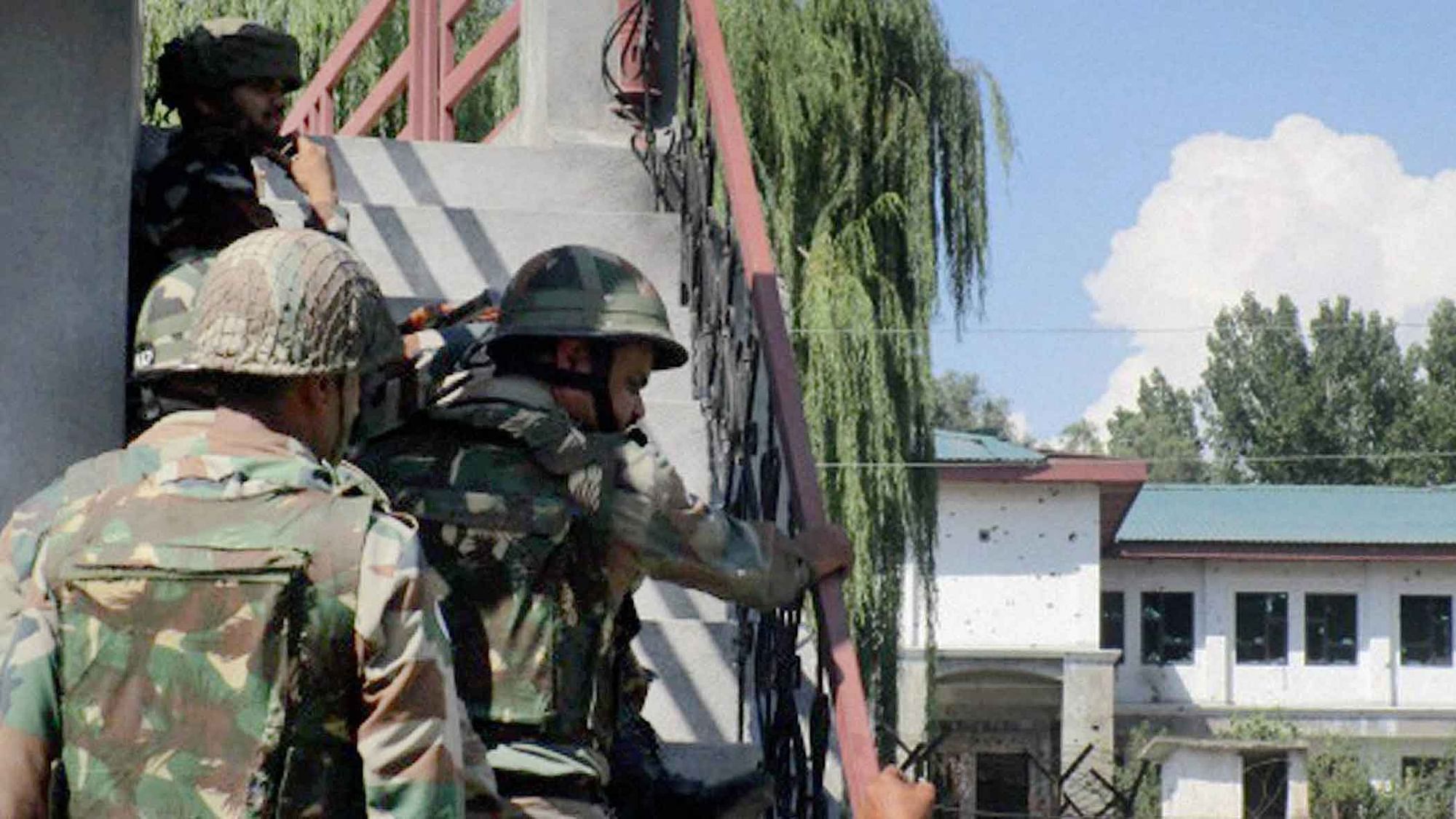 Security forces engaged in battle against terrorists. (Photo Courtesy: PTI)