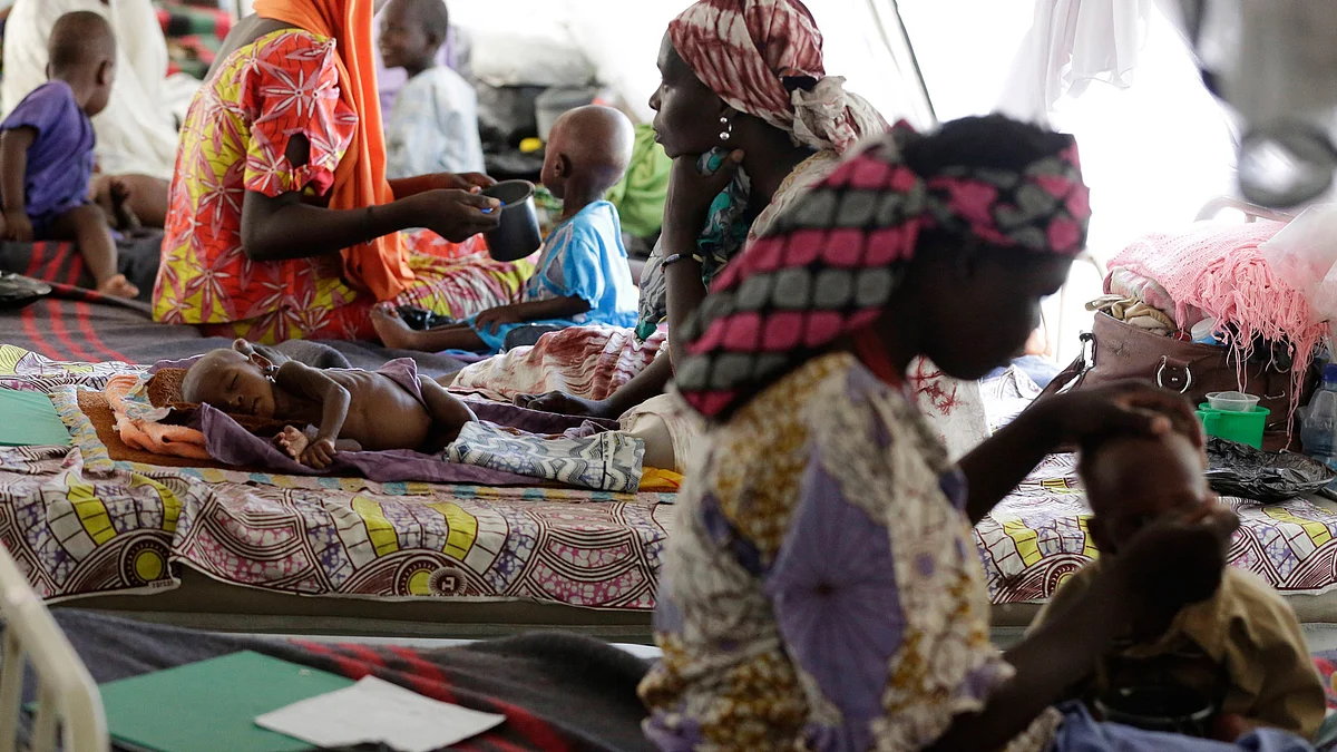 Women feed their malnourished children at a feeding centre run by Doctors Without Borders in Maiduguri, Nigeria. (Photo: AP)