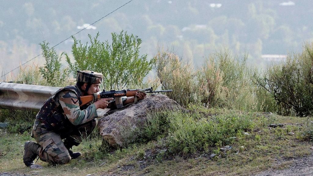File image of an Army soldier taking position near Army Brigade camp during a terror attack in Uri, Jammu and Kashmir on Sunday. (Photo: PTI)