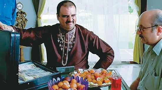 Boman Irani and Anupam Kher in <i>Khosla Ka Ghosla.</i>