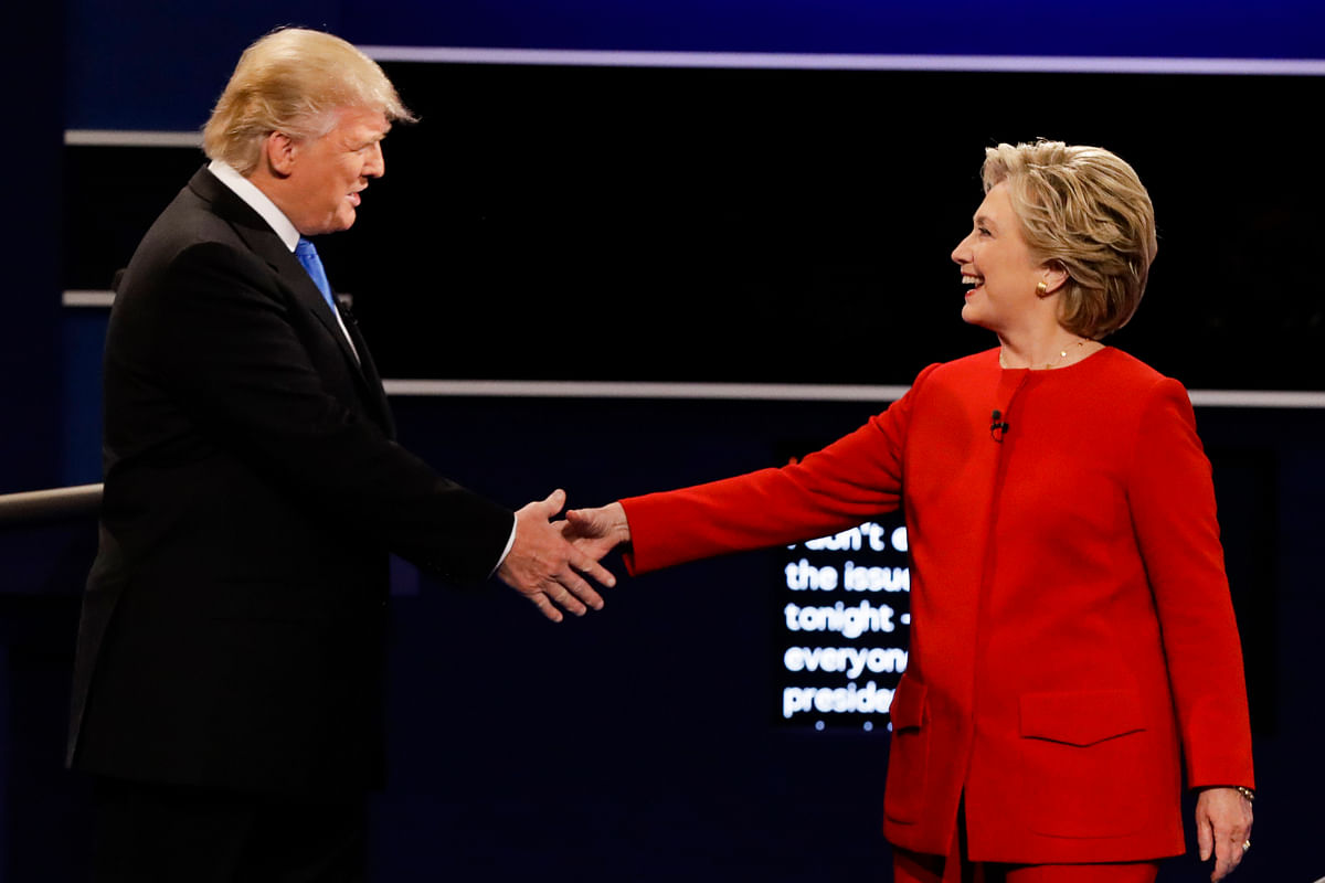 

Clinton maintained an even demeanour, smiling indulgently when Trump turned aggressive.